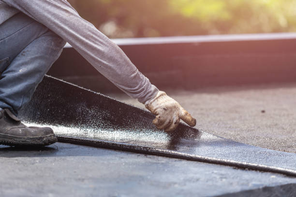 Professional Basement Waterproofing technician working in Towanda, KS